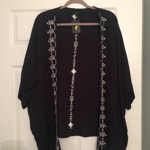 Navy Kimono with white detail.